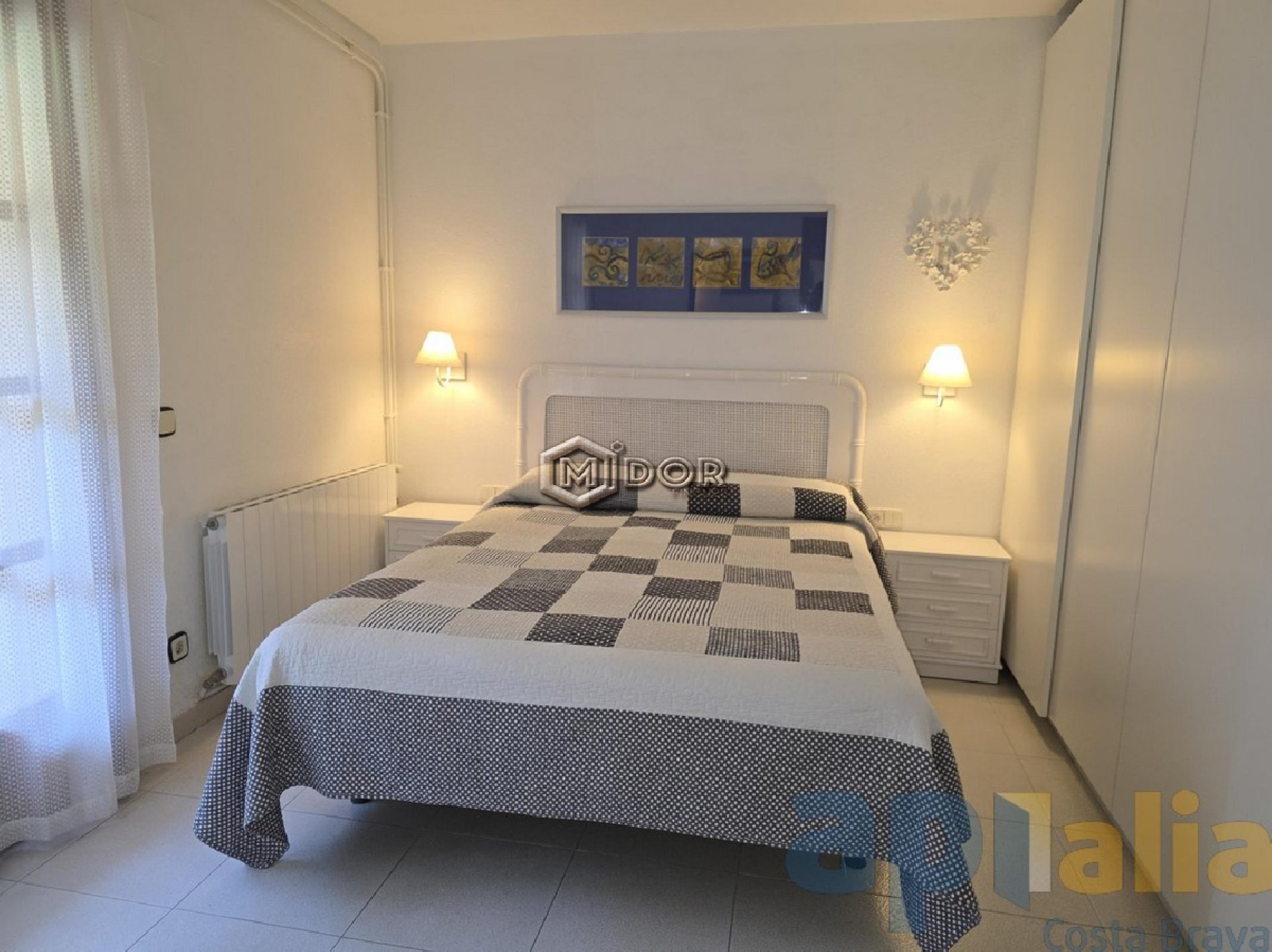 CASA ADOSSADA AMB JARDI I PISCINA