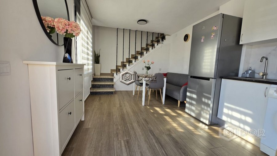 LOCAL CONDICINAT COM A APARTAMENT TIPUS DUPLEX